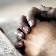 Praying Hands Representing Secondary School RE Assessments For KS3 and KS4 